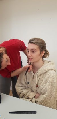 Student being made up by another student