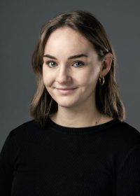 Headshot of female student with mid length brown hair