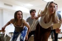 Actors in rehearsals, in dance routine